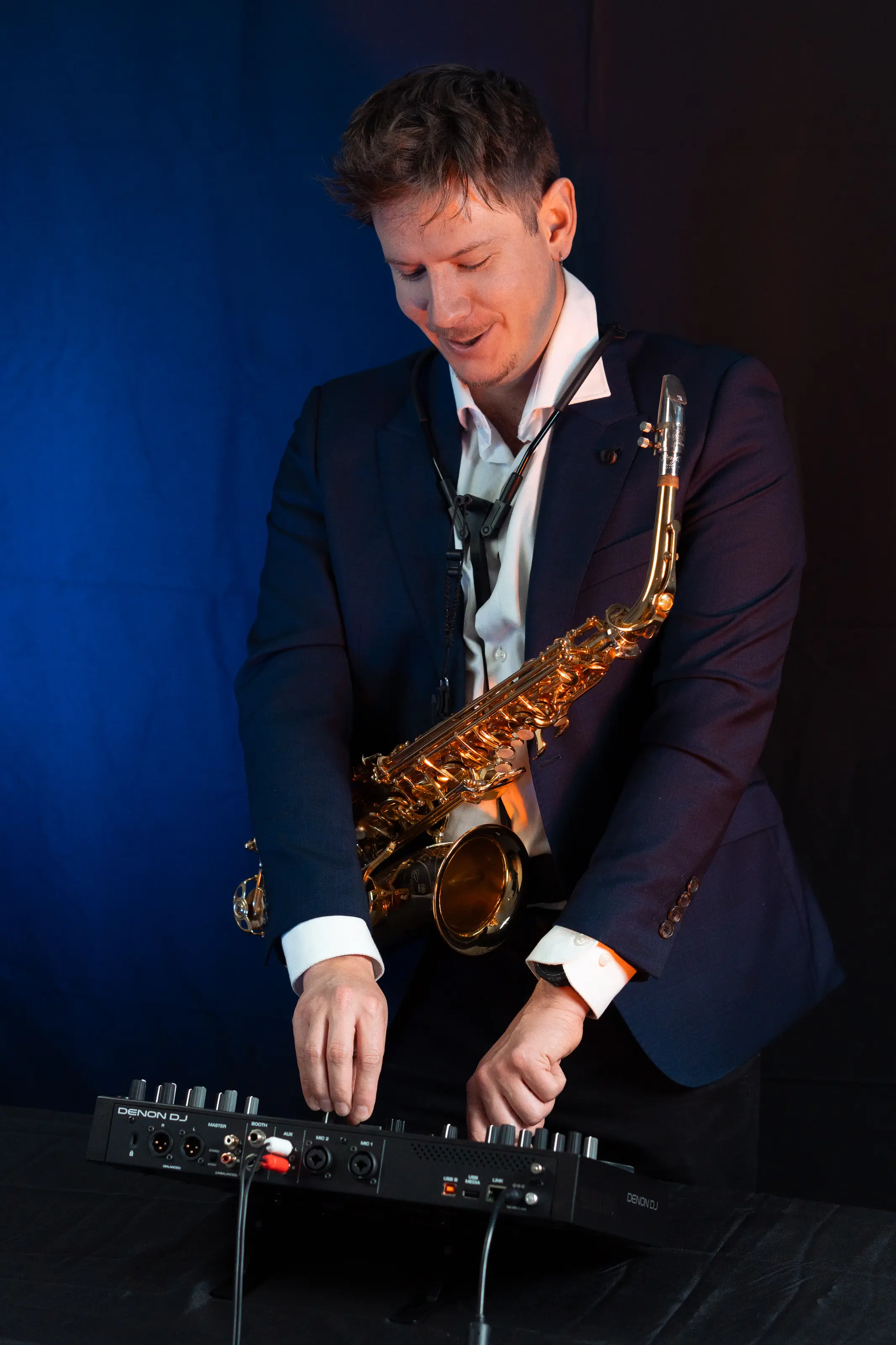 Gus Rodriguez playing saxophone live at an Adelaide event