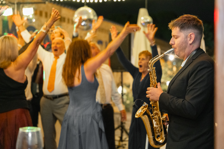 Gustime live performance at an Australian wedding or event — photograph 9